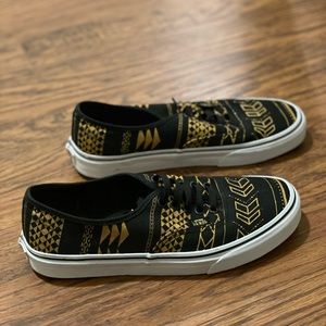 Black and gold vans shoes